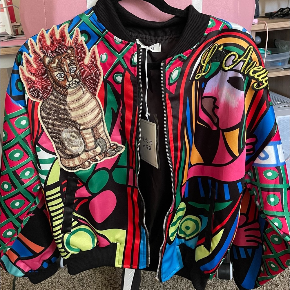 Super unique, artistic light jacket.